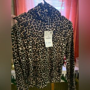 Women’s leopard turtleneck